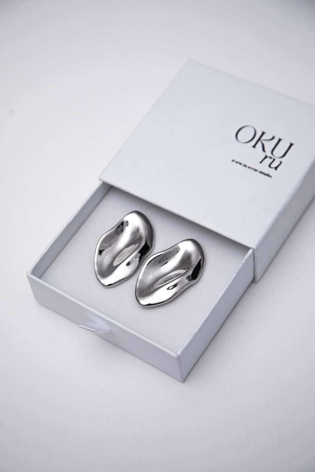 Aretes de forma irregular