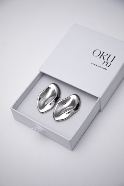 Aretes de forma irregular